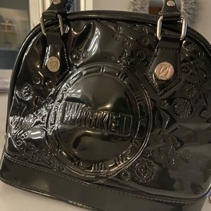 WICKED the musical.  Black patent leather purse, super fun and sassy!